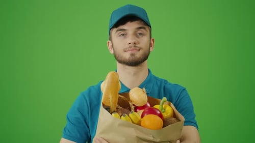Green Screen Delivery Man Brings Paper Bag with Food
