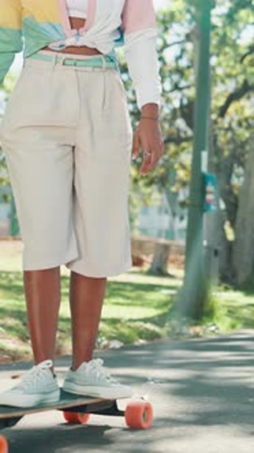 Friends, legs of woman and skateboard at park for weekend break, bonding and streetwear fashion