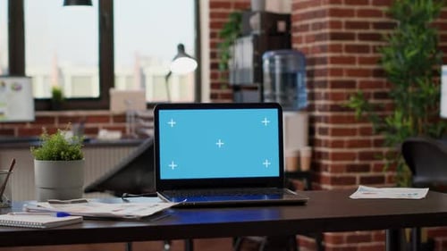 Nobody in Company Office with Greenscreen Template on Laptop