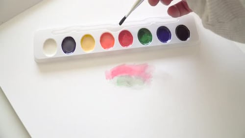 Painting using multi color palette used for creating art .