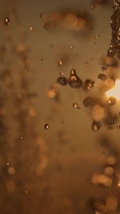 Golden Water Droplets Abstract Vertical Background