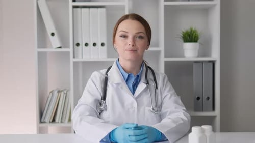 Woman Doctor Explaining Medical Information in Office