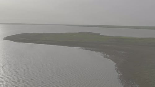 Water Surface With a Small Wave Waves on the Pond Surface Waves in Shallow Water Aerial View Flying