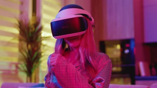 Woman Enjoys Virtual Reality Experience with VR Headset
