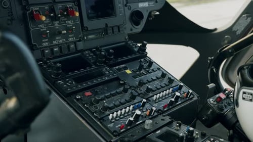 Control panel inside helicopter cockpit - dolly shot