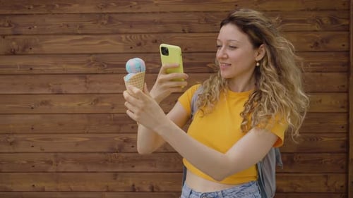 Woman Takes Selfie with Ice Cream