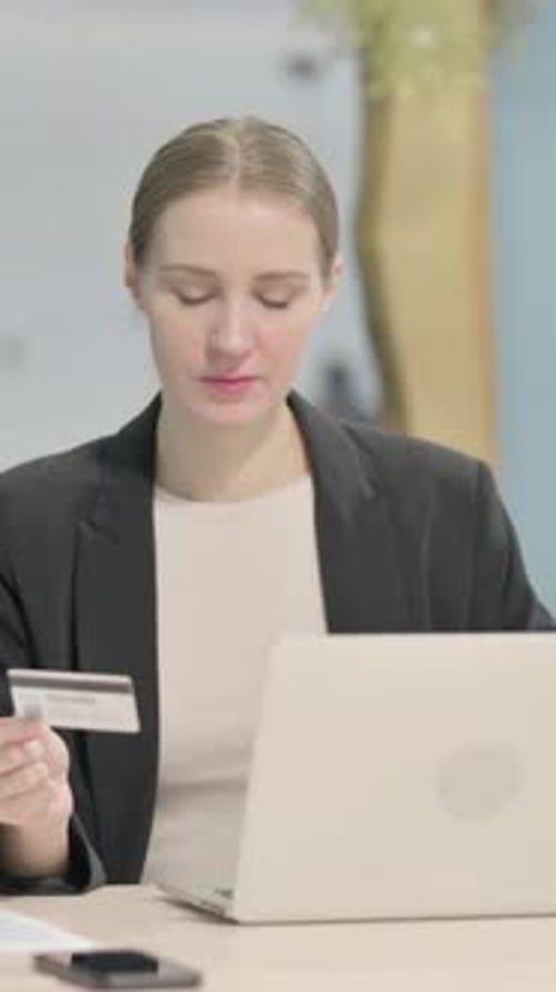 Businesswoman Unable to make Online Payment on Laptop, Vertical Video