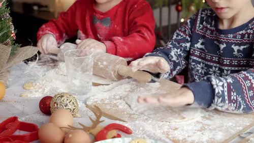Children Making Christmas Cookies Together at Home