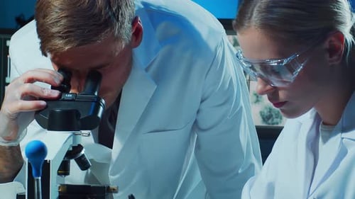 Scientific Laboratory Filled with Various Research Equipment Scientists are Conducting Experiments