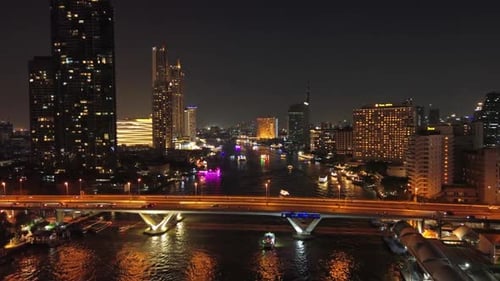 Skyscrapers in Bangkok City and River at Night