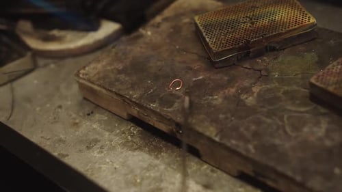 Jeweler Soldering Ring at Workshop Studio
