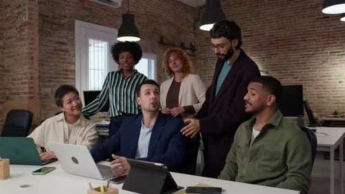 Diverse Team Meeting Collaborating in Modern Office