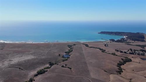 Breathtaking Aerial View of Stunning Coastal Landscape Showcasing Clear Blue Ocean Water