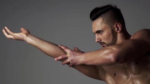 Muscular Sexy Man Man Flexing Biceps Male Athlete Sportsman Flexing Bicep Looking at Muscle Biceps