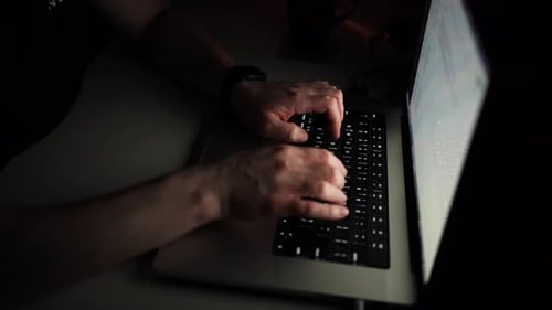 Man working on laptop on the table