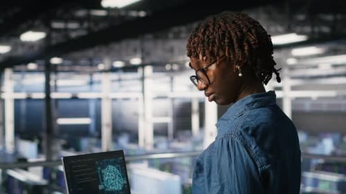 Data Center Coworkers Doing Maintenance on Mainframes Handling AI