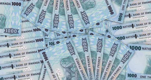 Rwanda francs banknotes in a fan mosaic pattern loop