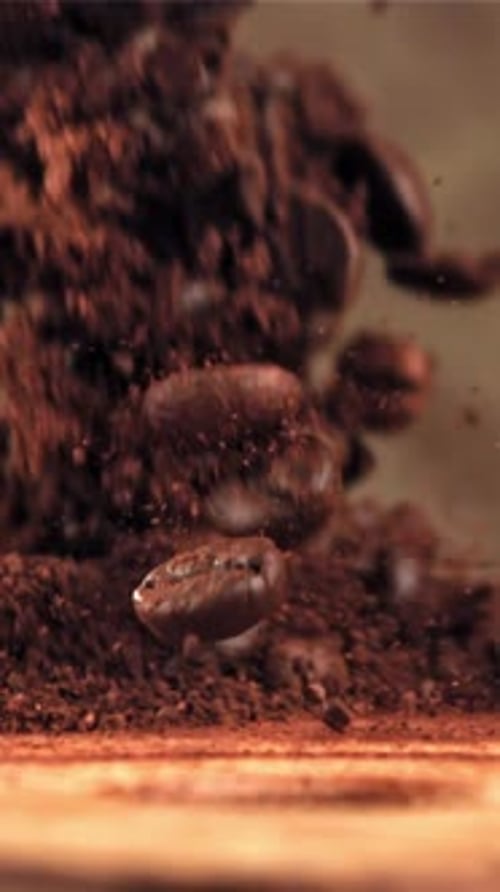 Ground Coffee Falls on a Wooden Board Filmed on a Highspeed Camera at 1000 Fps