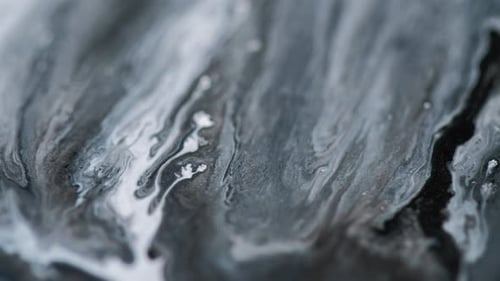 Abstract Swirling Black, White, and Gray Liquids