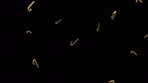 Falling candy canes over alpha channel. Rain of candy canes across the screen. Candy cane background