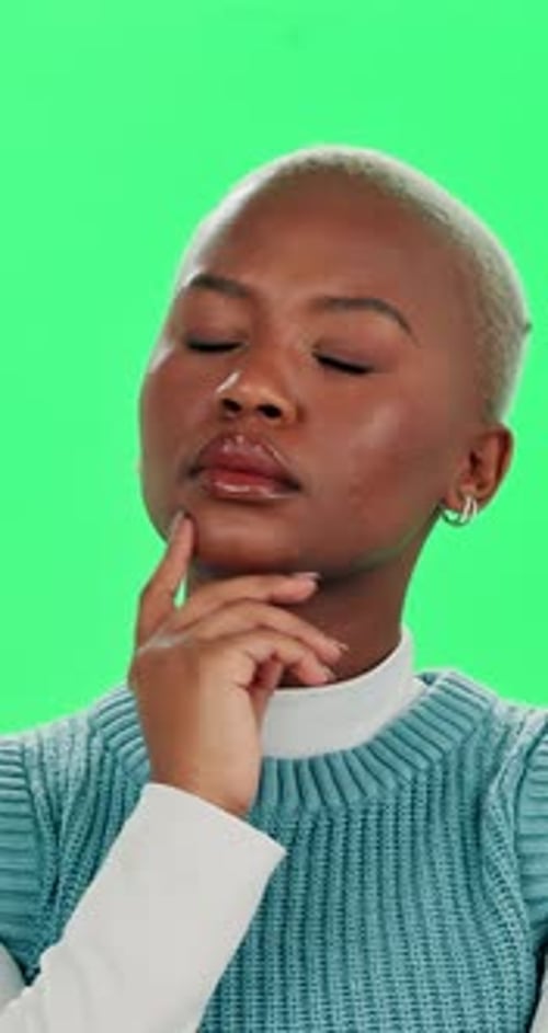 Black woman, thinking or decision with green screen for choice, selection