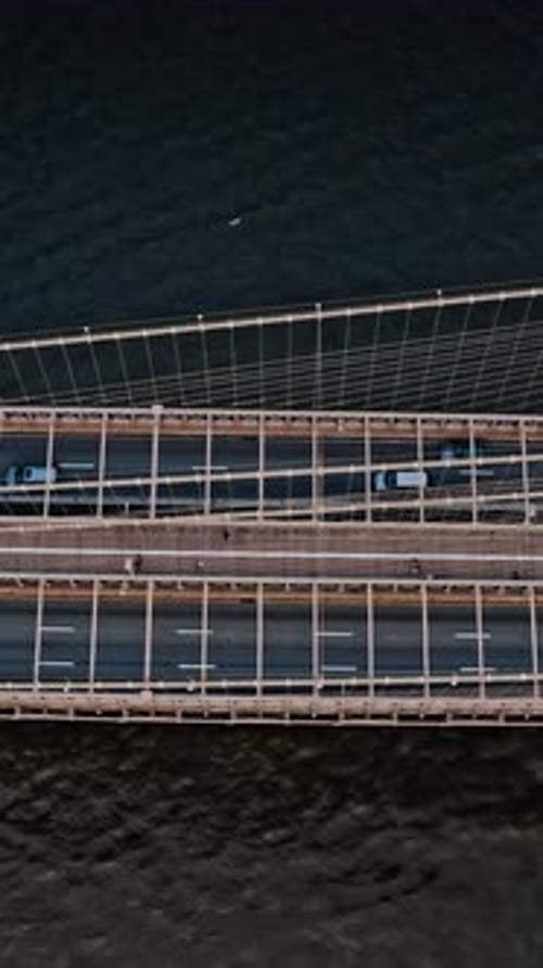 Brooklyn Bridge aerial view showcasing its structure and traffic movement