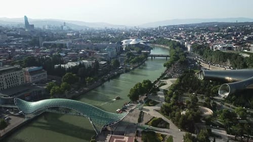 Aerial View of Tbilisi with Peace Bridge and Kura River
