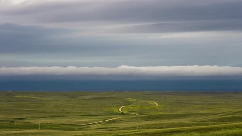 Stormy Skies Rolling Over Beautiful Country Scenes With Winding Road