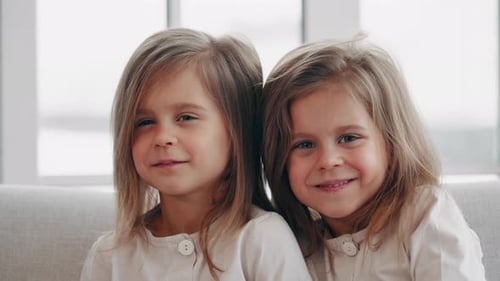 Two Young Girls Smiling Indoors Portrait