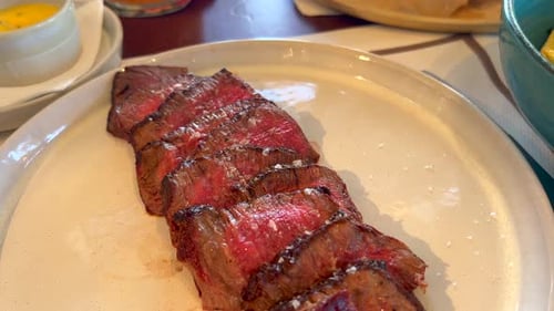 Tasty beef filet steak with french fries at Bibo Beach House Tarifa restaurant, tapas of Dani Garcia
