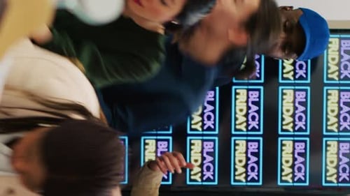 Crowd Reaches for Deals During Black Friday