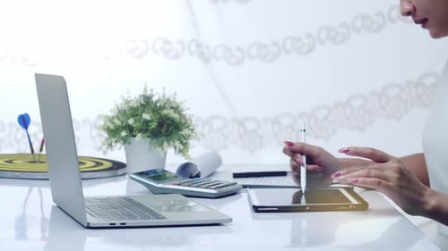 A successful businesswoman reviews sales data and adjusts plans to meet he target goals - sliding vi