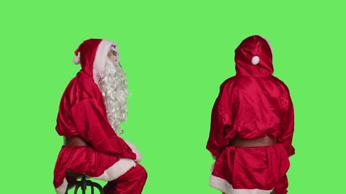Two Santas Sitting on Green Screen