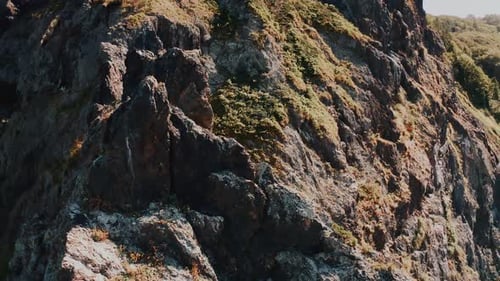 Fly Around the Rock Overlooking the Mountains and the Sea Waves and Coastal Rocks Sakhalin