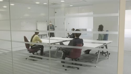 Team Meeting in Modern Office with Face Masks