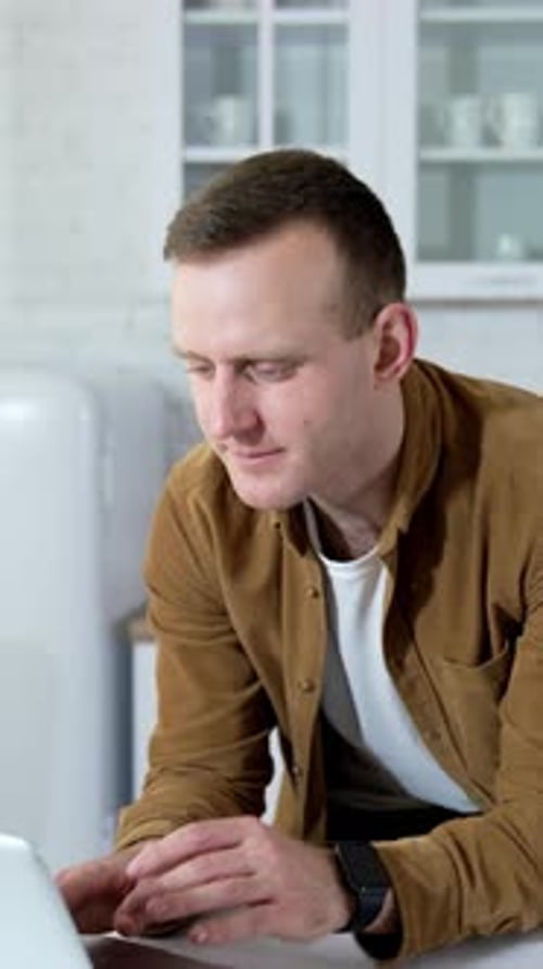 Young Adult Man on Laptop Video Call