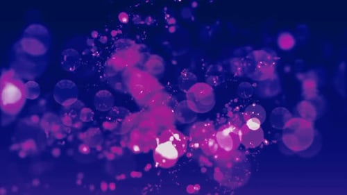 Dynamic Shimmering Pink and Purple Particle Bokeh Loop Background