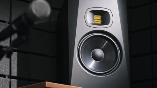 Studio Bass Speaker Vibrates From Loud Music in a Recording Studio CloseUp
