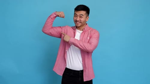 Young Adult Poses and Points to Bicep