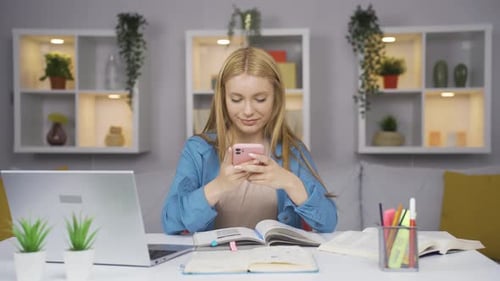 Female student chatting on the phone.