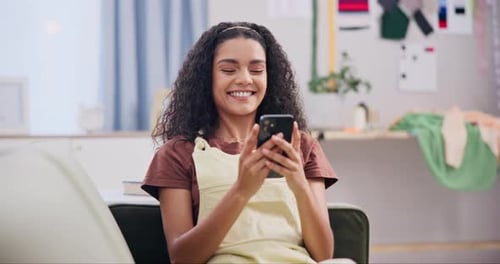 Woman, laughing and typing with phone on sofa for text message, social media post