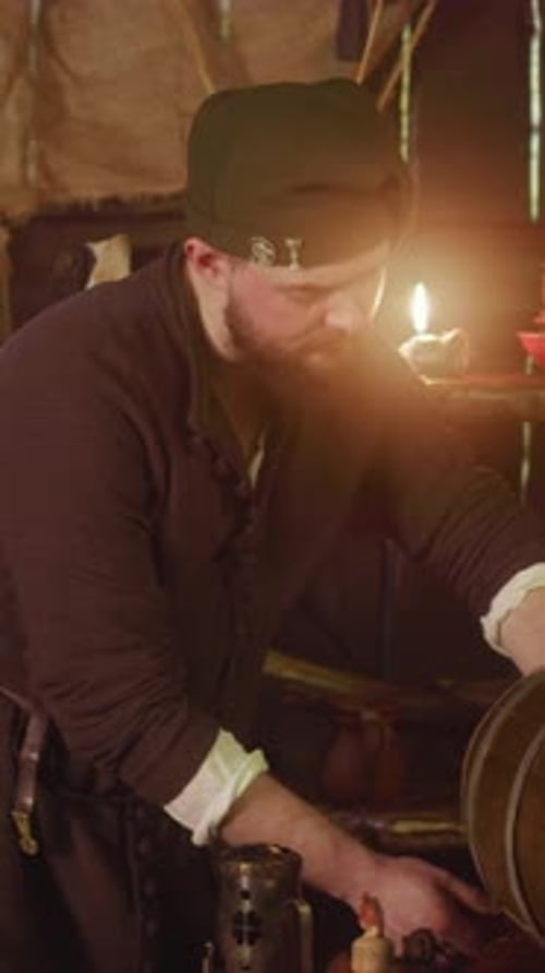 Barkeeper Pours Ale and Turns to Counter