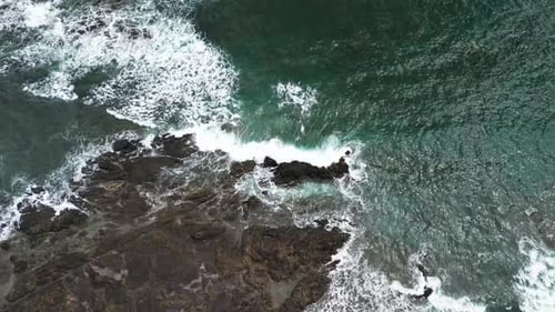 Rocks Next To The Blue Ocean