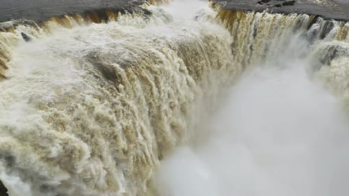 Crashing Waterfalls at Iguazu Falls Cascade Into Canyon in Stunning Display