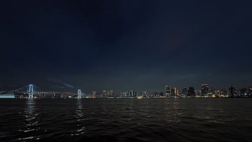 Distant Rainbow Bridge and City Skyline
