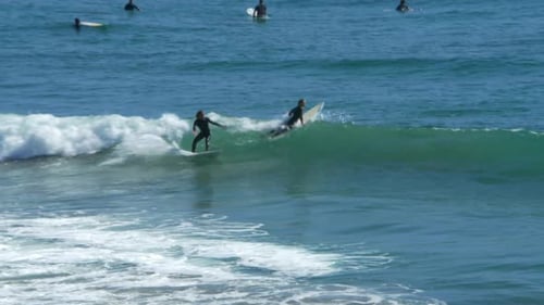 Surfer Catches and Rides Wave Barrel