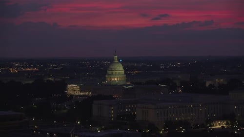 United States capitol building shines at sunrise in Washington dc aerial view