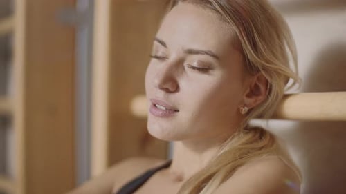 Sad Sport Woman Sitting in Fitness Club. Portrait of Upset Sportwoman Looking