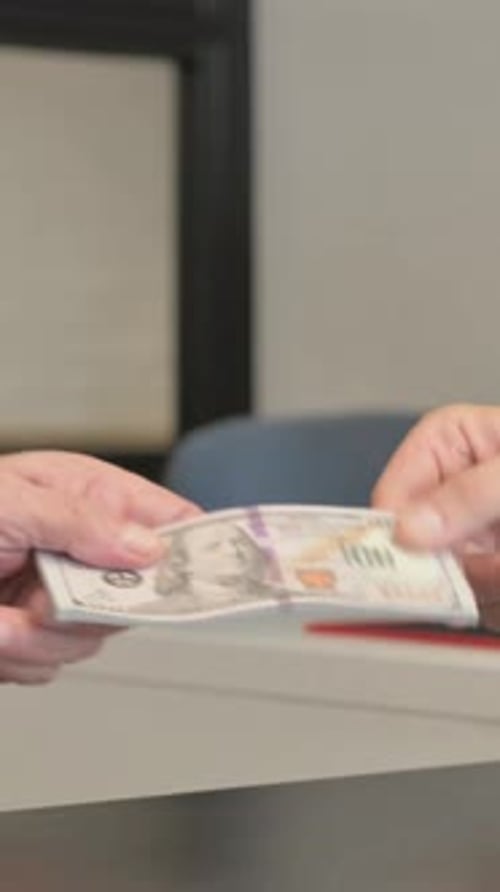 Close Up of Man Gives Money to Old Man and Shakes Hand, vertical video