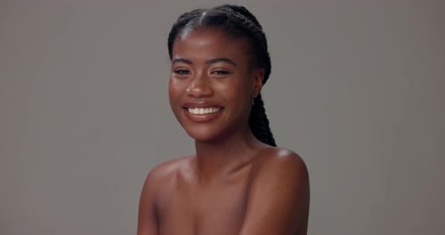 Black woman, portrait and smile in studio for skincare, confidence or natural beauty